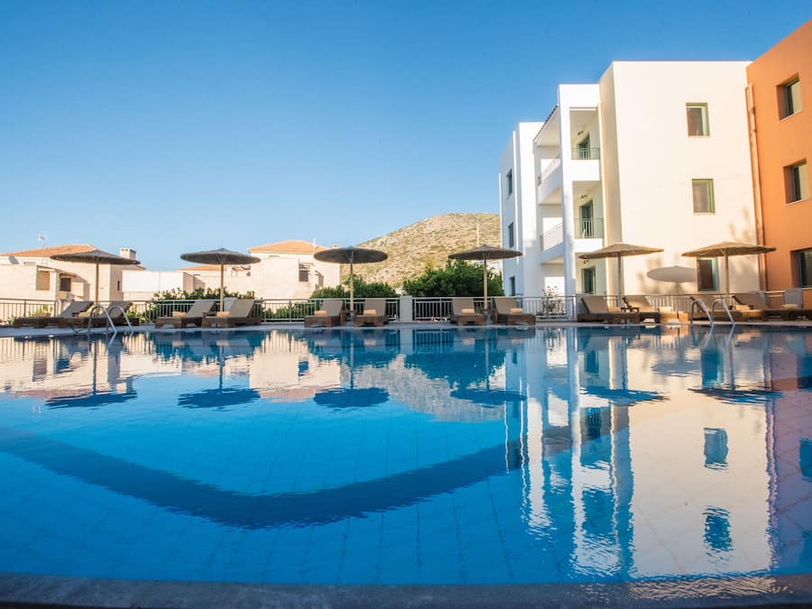 Outdoor pool, open 9:00 AM to 6:00 PM, pool umbrellas, pool loungers