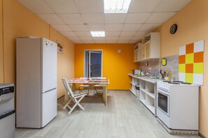 Fridge, microwave, oven, cookware/dishes/utensils