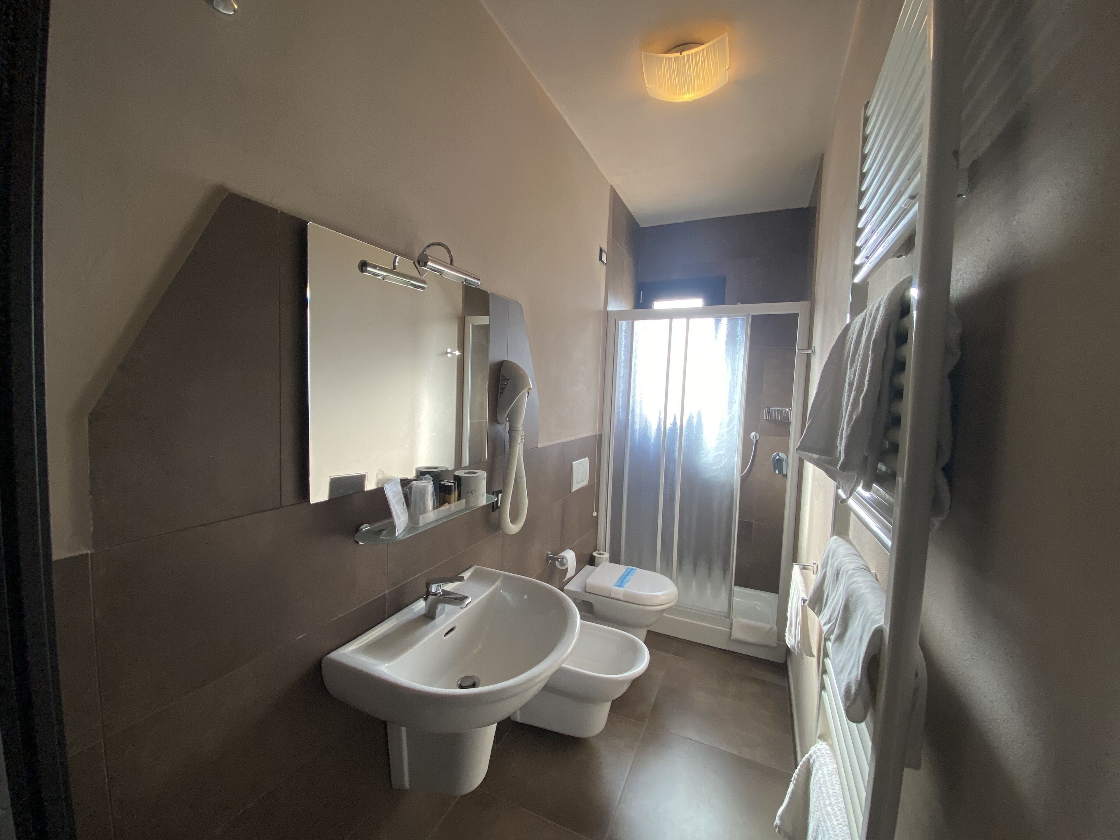 classic quadruple room | bathroom | shower, bidet, towels