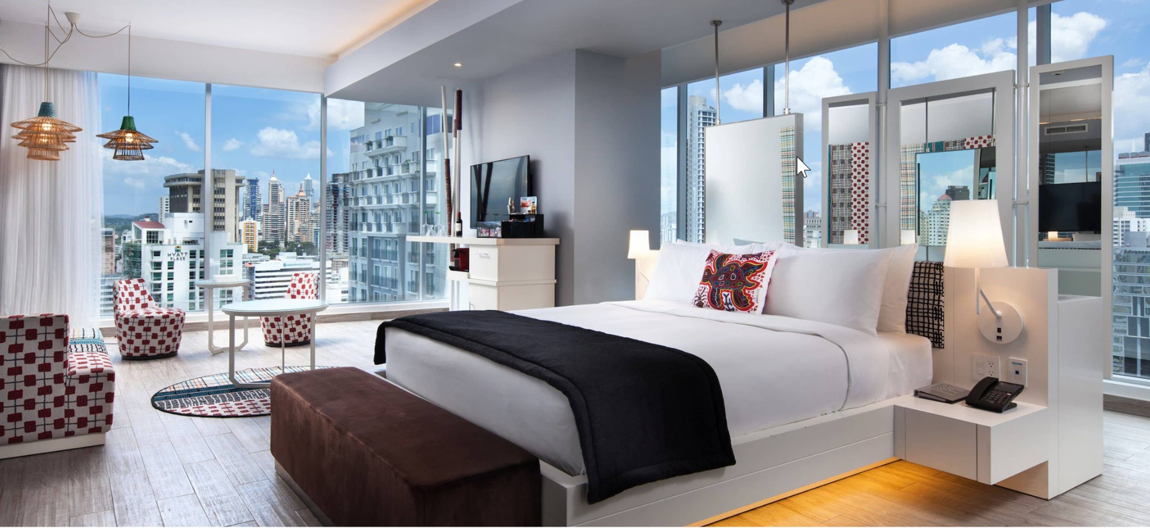 urban suite,1 king, partial city view | in-room safe, blackout curtains, iron/ironing board