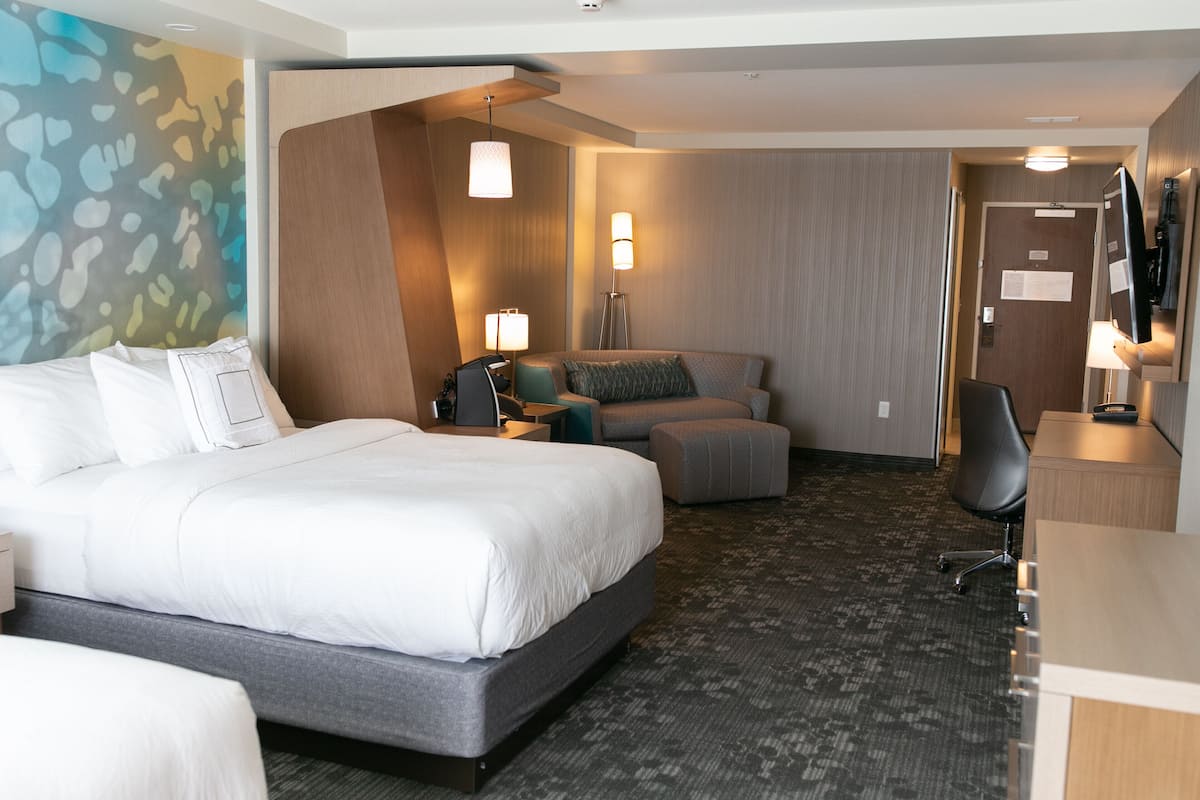 Hypo-allergenic bedding, down comforters, desk, laptop workspace