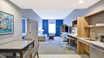 Hypo-allergenic bedding, desk, laptop workspace, blackout curtains