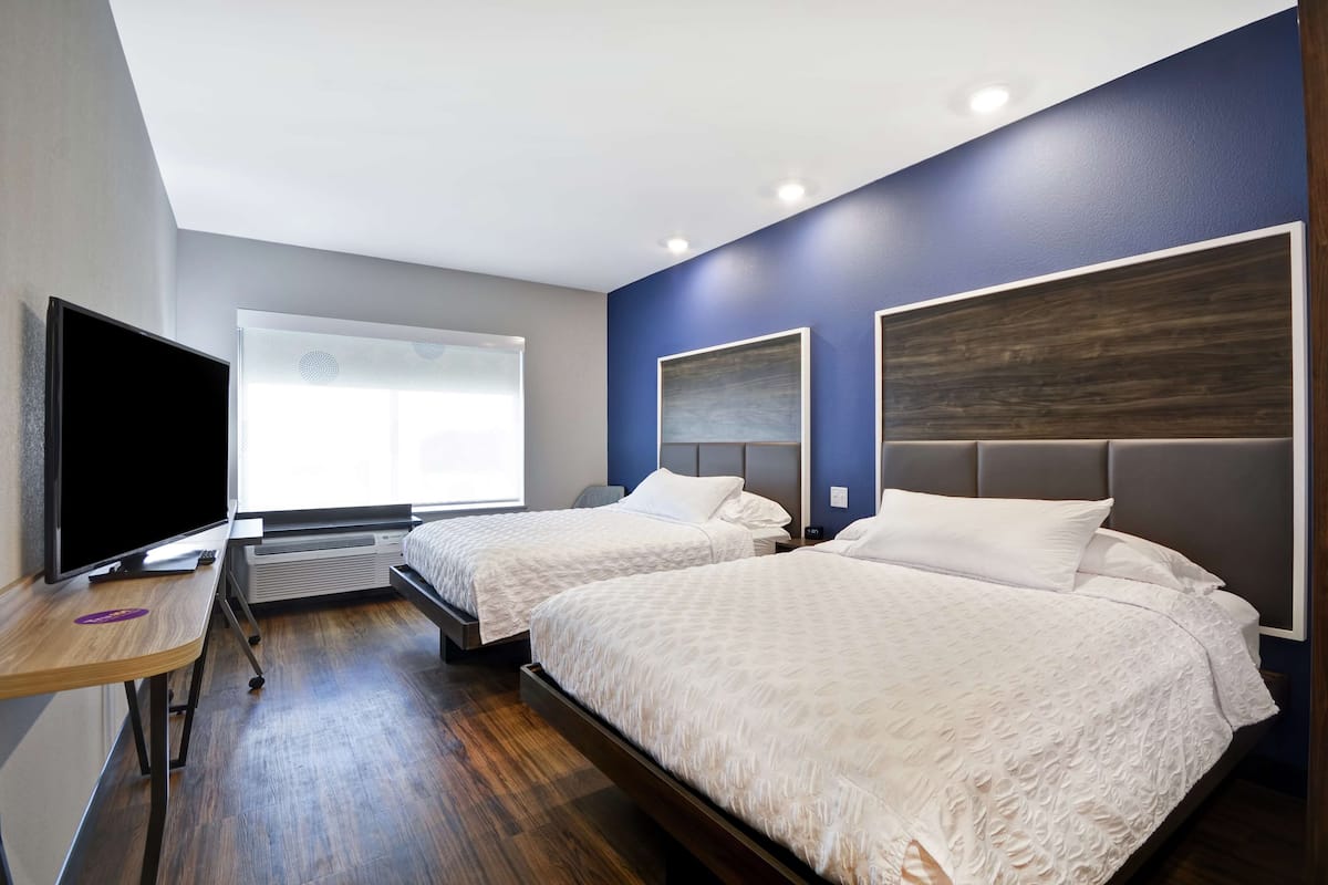 Room, 2 Queen Beds | In-room safe, iron/ironing board, free WiFi, bed sheets