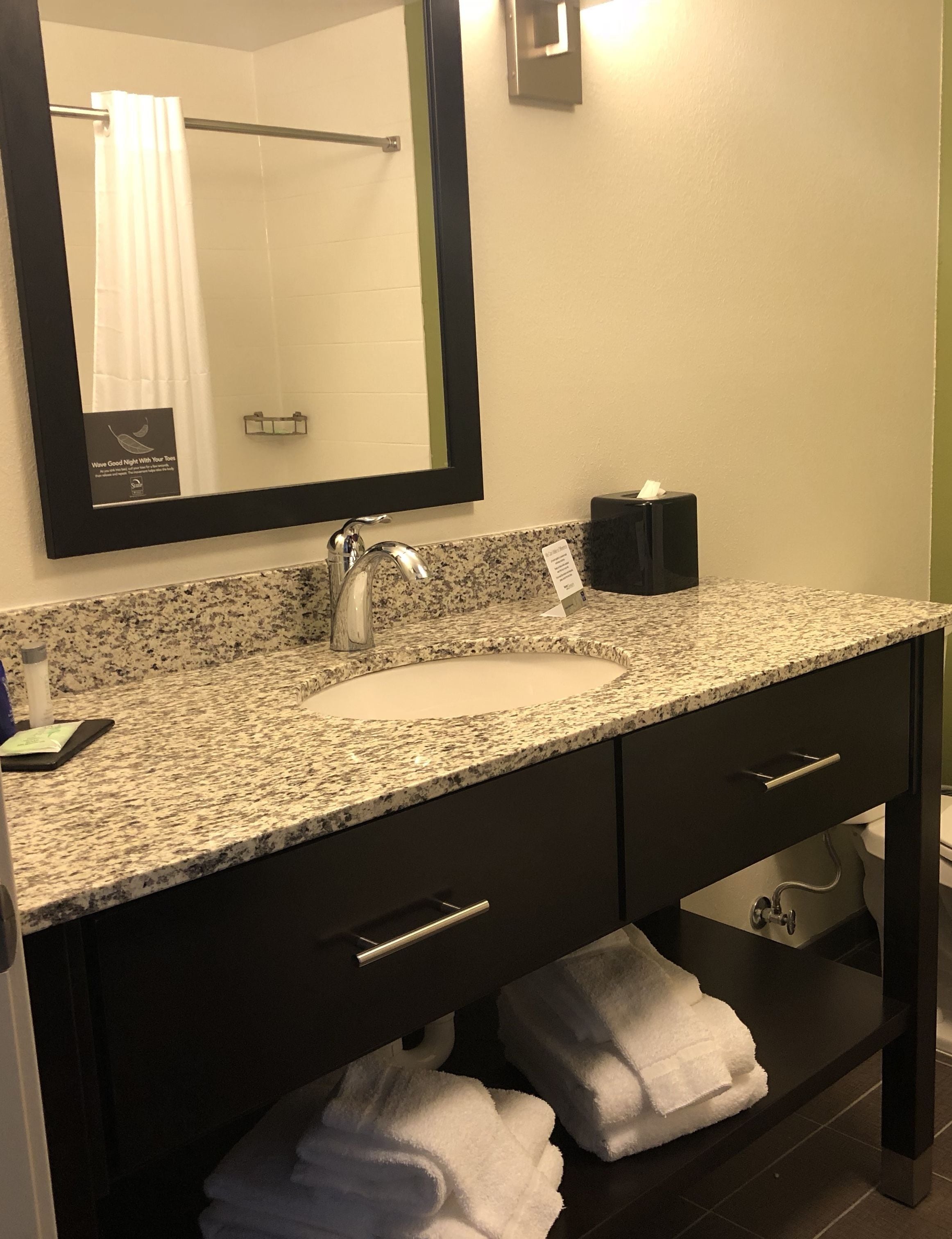 combined shower/bathtub, free toiletries, towels