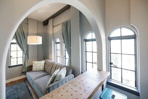 Luxury Penthouse Suite | Living area | 55-inch flat-screen TV with digital channels, TV