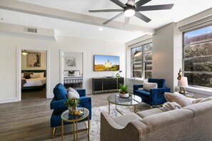 Family Condo, 4 Bedrooms, 2 Bathrooms | Living room | 65-inch flat-screen TV with satellite channels, TV - Modern Condos in California Building by Hosteeva (New Orleans)
