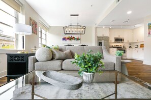 Living room - Modern Condos in California Building by Hosteeva (New Orleans)