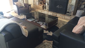 Apartment, 3 Bedrooms | Living area | Flat-screen TV, fireplace