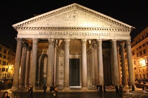 A grand neoclassical building with large columns and a prominent entrance. - Amazing apartment center Rome 100 meters from Vatican with Garage and Free WIFI  (Roma)