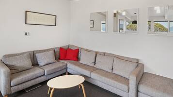 Apartment, 2 Bedrooms | Living area | Flat-screen TV, DVD player