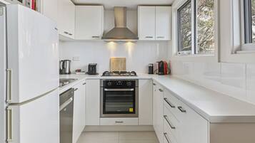 Apartment, 2 Bedrooms | Private kitchen | Full-sized fridge, microwave, oven, stovetop