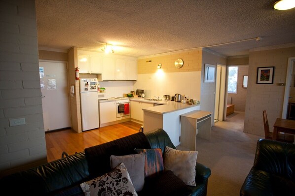 Apartment, 2 Bedrooms | Living area | Flat-screen TV