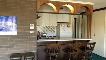 Apartment, 3 Bedrooms | Private kitchen | Full-sized fridge, microwave, oven, stovetop