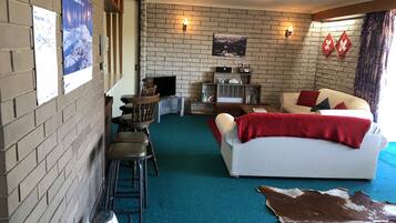 Apartment, 3 Bedrooms | Living area | Flat-screen TV