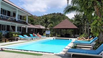 Outdoor pool, open 7:00 AM to 8:00 AM, pool loungers