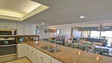 Coffee/tea maker, fridge, microwave, oven