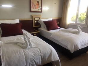 Kamar Single | Seprai premium dan Wi-Fi gratis