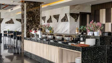 Breakfast, lunch, dinner served; local and international cuisine
