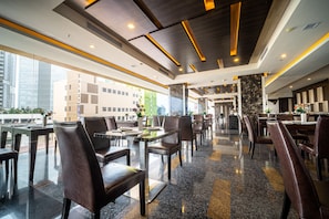 Breakfast, lunch, dinner served; local and international cuisine