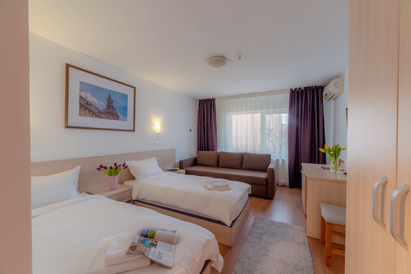 Family Quadruple Room | Hypo-allergenic bedding, memory foam beds, desk, laptop workspace