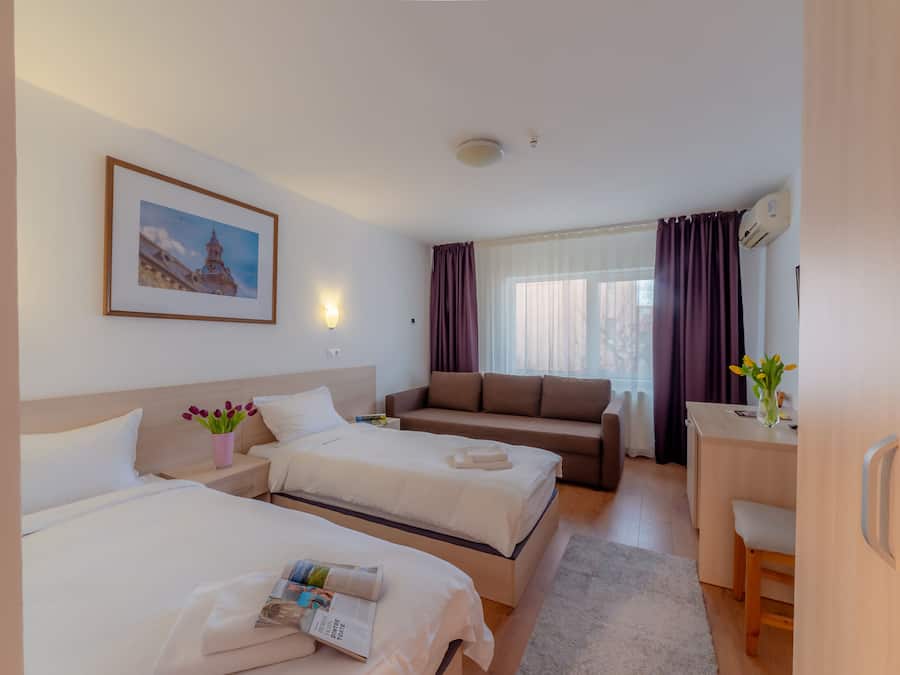 Hypo-allergenic bedding, memory-foam beds, desk, laptop workspace