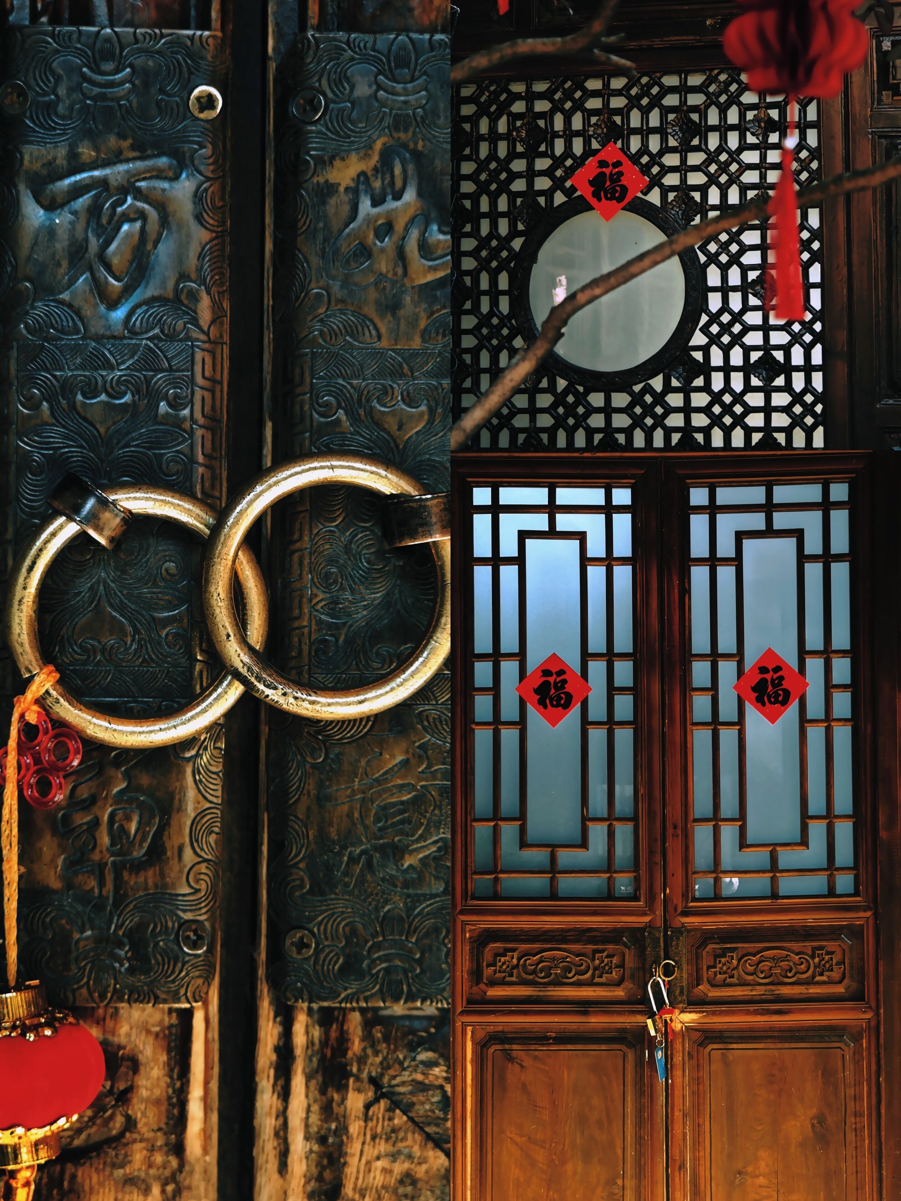 A traditional wooden door with intricate carvings and a red decorative element.