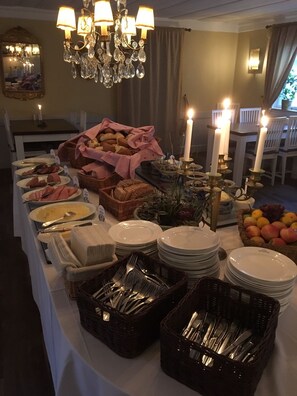 Enjoy a self-service meal with a variety of dishes and fine dining ware.