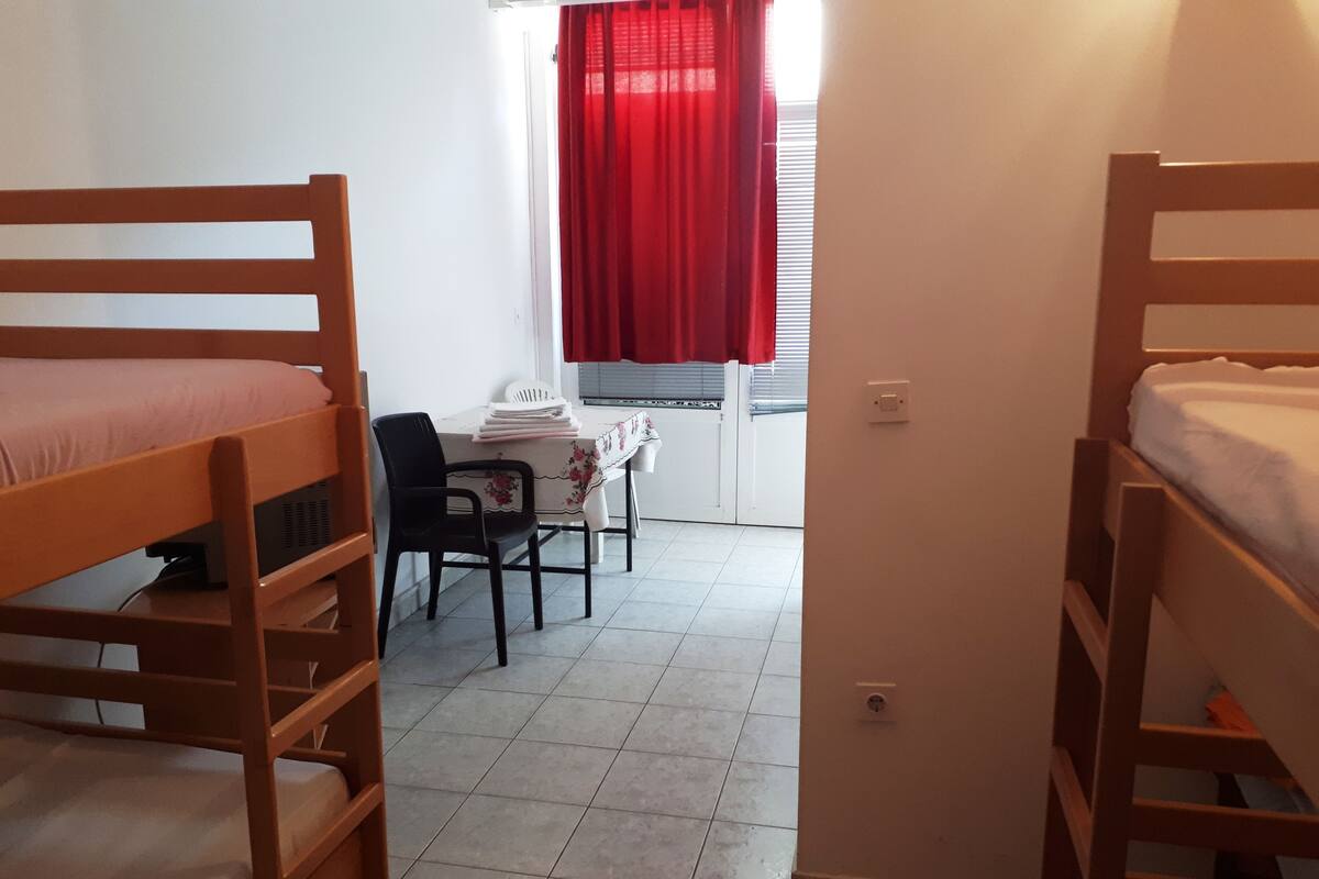 Quadruple Room, Private Bathroom | 1 bedroom, desk, free WiFi, bed sheets