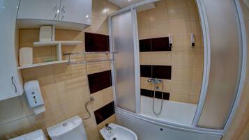 Standard Double Room, 1 Double Bed | Bathroom | Combined shower/bathtub, deep-soaking bathtub, hydromassage showerhead