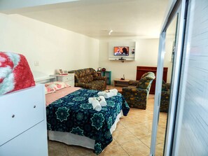 Apartamento conforto, 1 quarto | 1 quarto, Wi-Fi de cortesia, roupa de cama