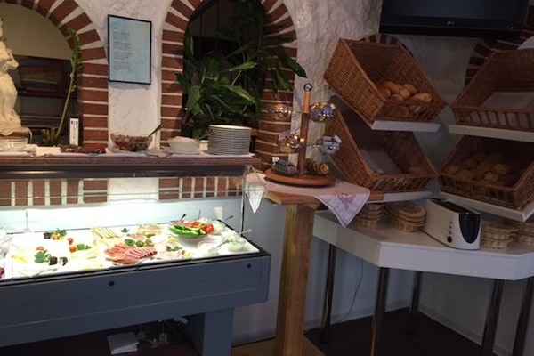 Daily buffet breakfast (EUR 15 per person)