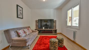 Apartamento | Área de estar | TV de tela plana 40 polegadas com canais a cabo, TV