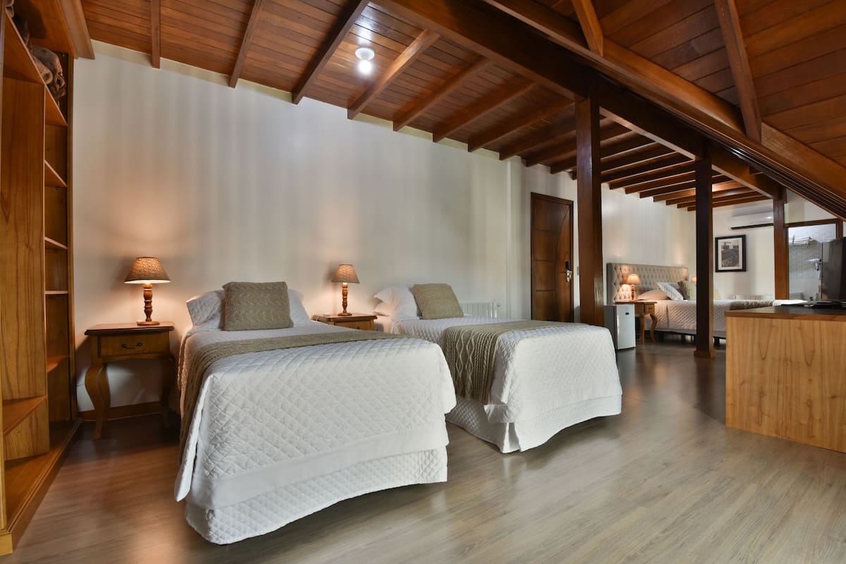 family room | minibar, in-room safe, blackout curtains, soundproofing