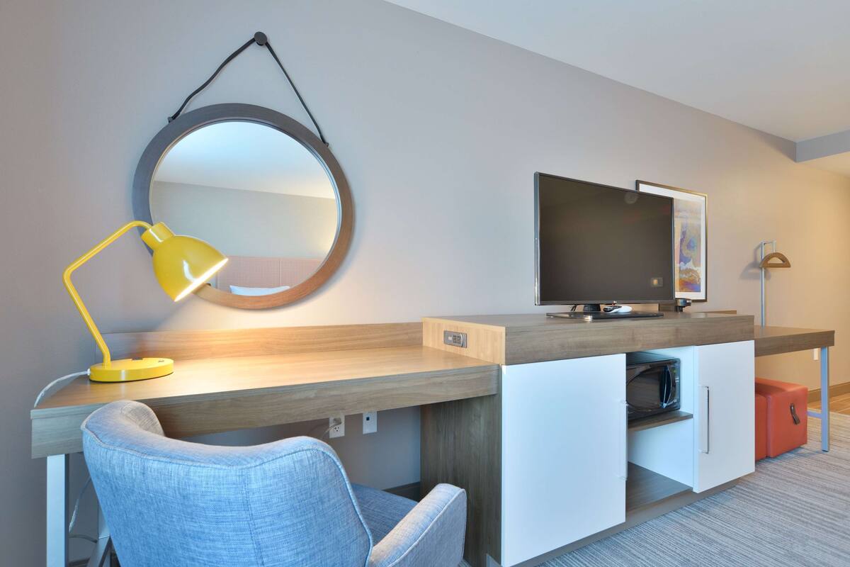 room, 2 queen beds, refrigerator & microwave | in-room safe, blackout curtains, cots/infant beds, rollaway beds