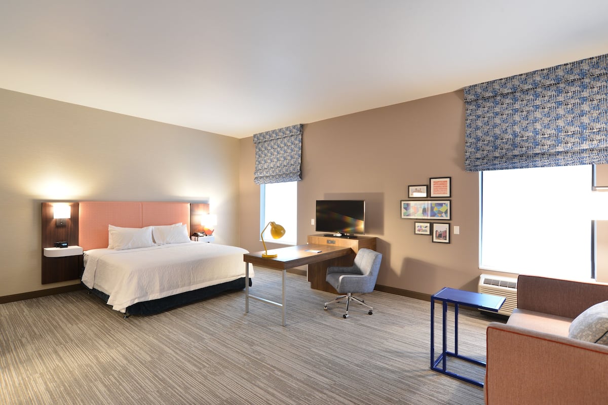 studio, 1 king bed, accessible (hearing) | bathroom | combined shower/bathtub, designer toiletries, towels