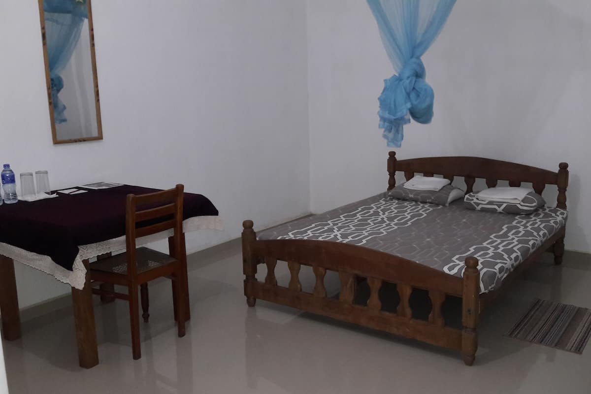 Basic Double Room, 1 Bedroom, Garden View | 1 bedroom, free WiFi