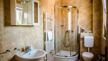 Shower, free toiletries, hair dryer, slippers