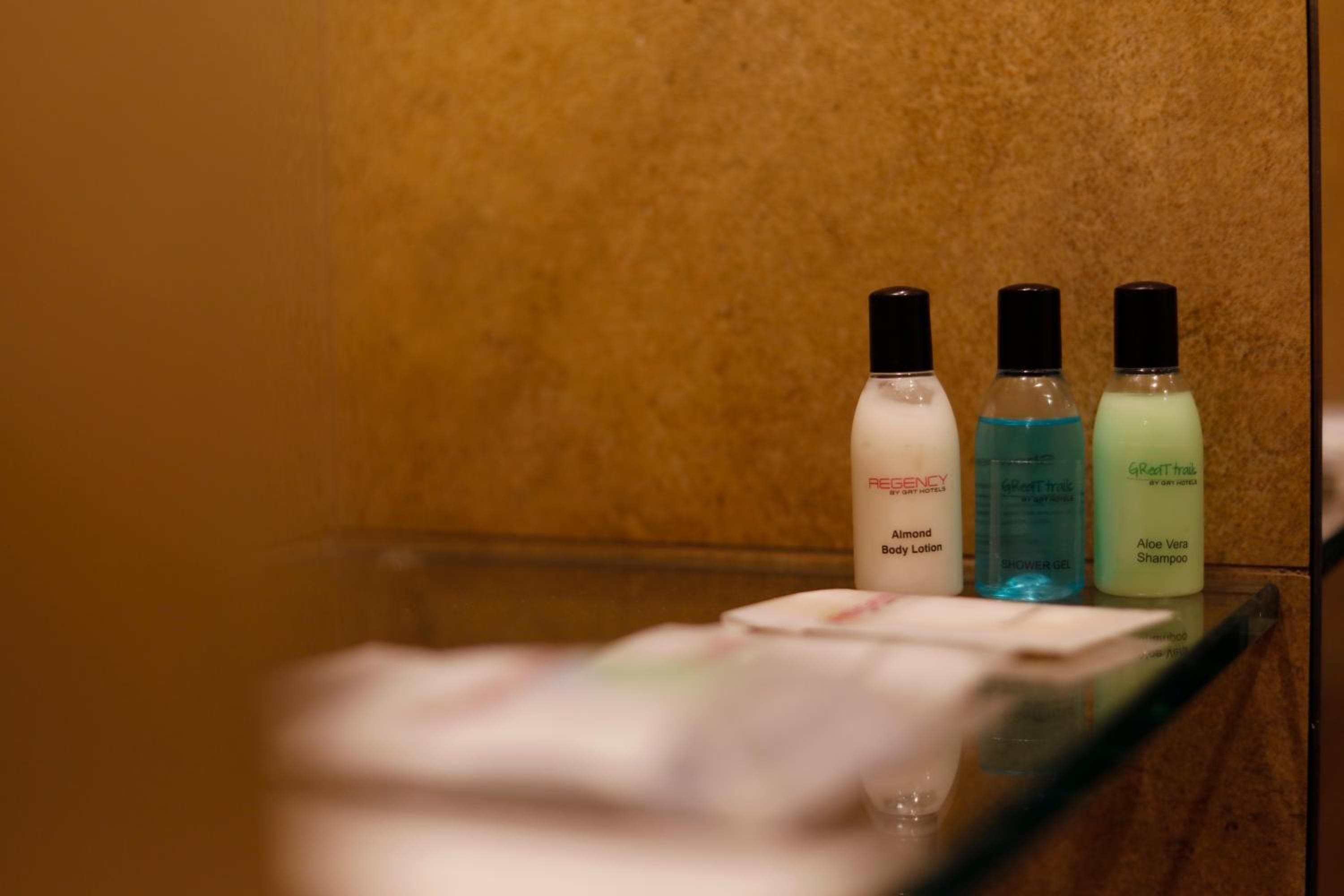 shower, free toiletries, slippers, towels