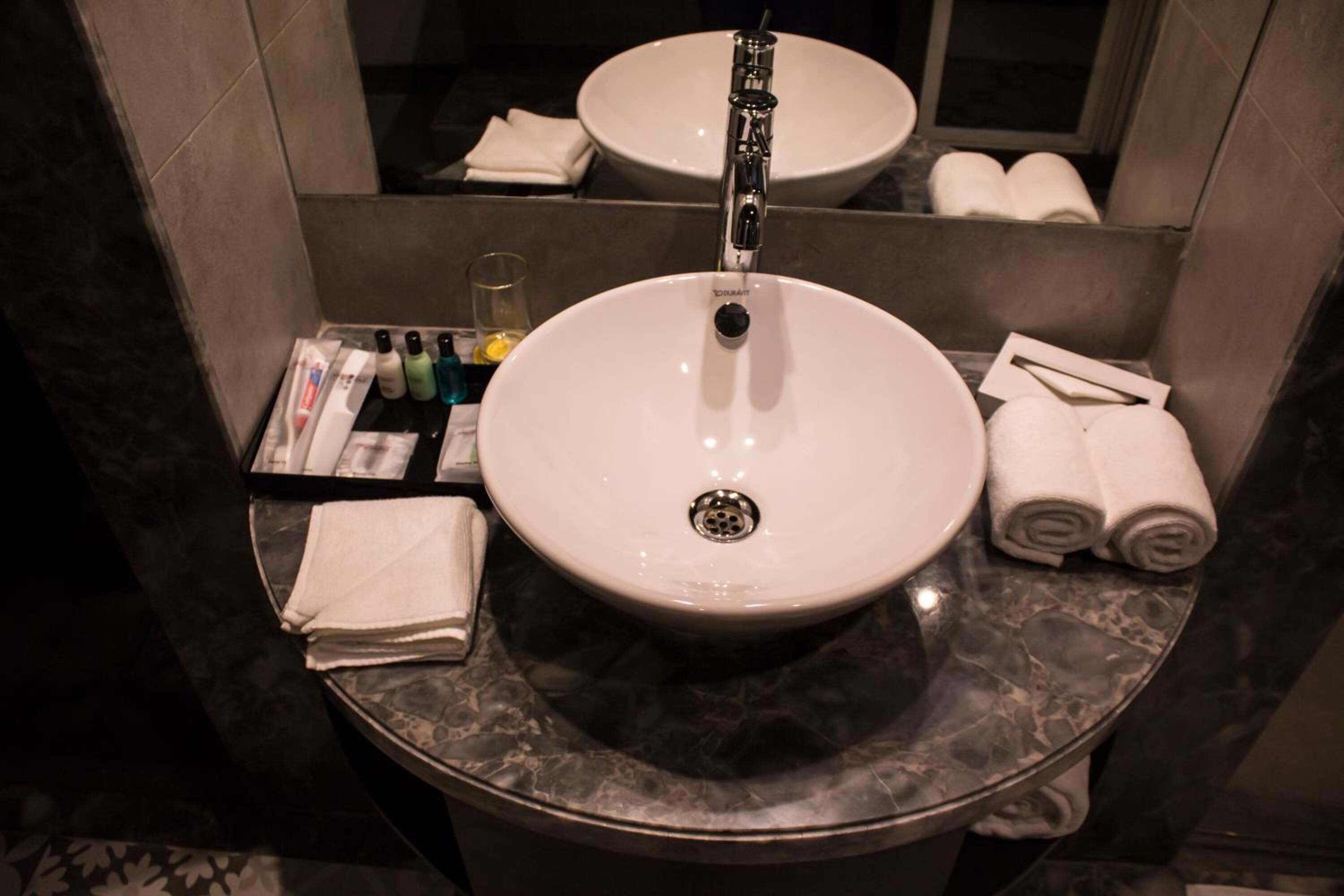 shower, free toiletries, slippers, towels