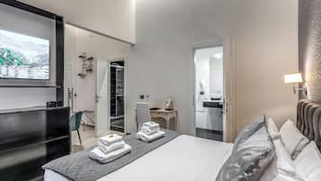 Suite | Ropa de cama de alta calidad, minibar, caja fuerte y escritorio