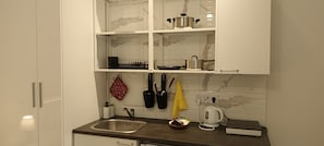 Suíte estúdio urbana, 1 quarto, para não fumantes | Cozinha privada | Frigobar, chaleira elétrica