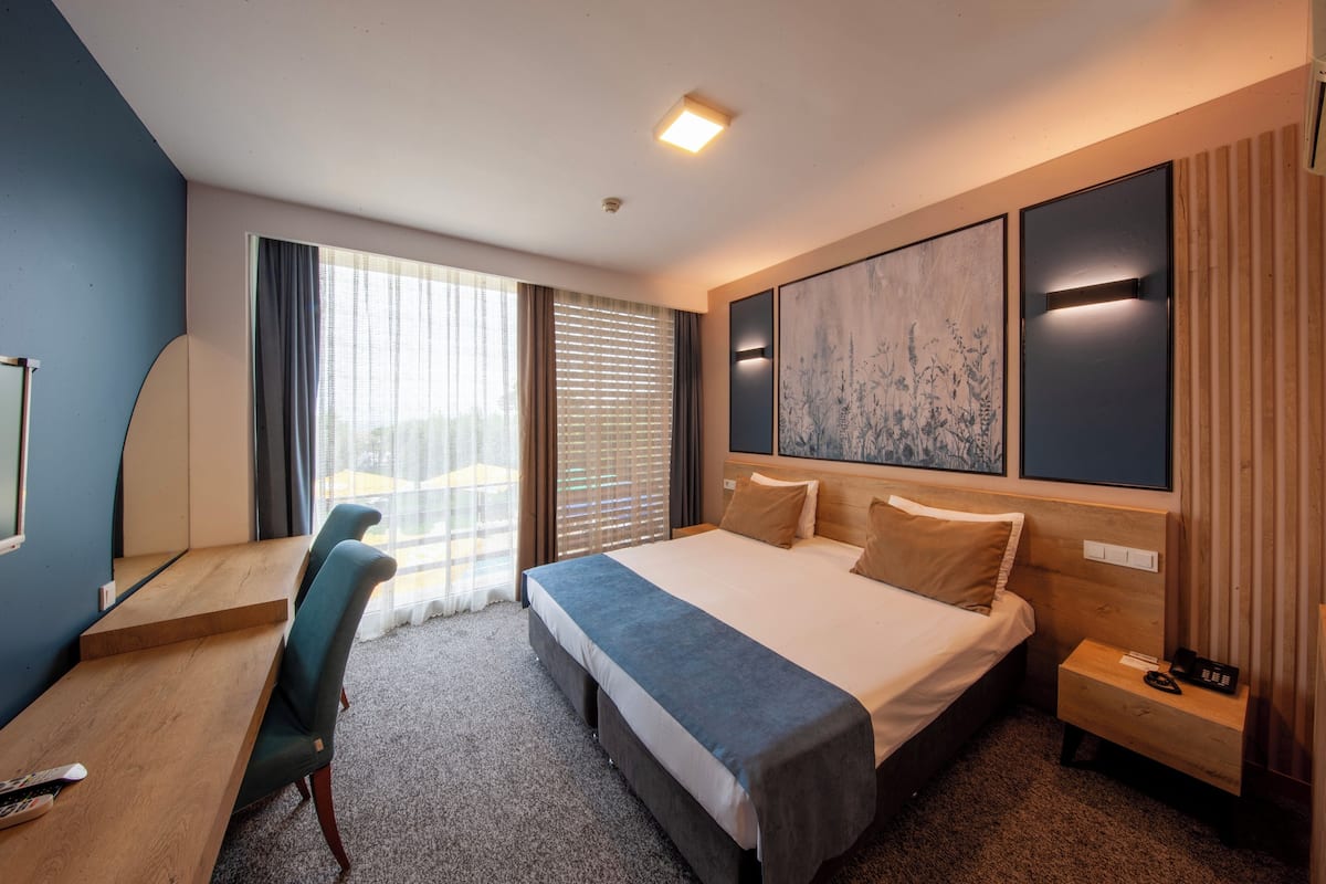 1 Schlafzimmer, hochwertige Bettwaren, Minibar, Zimmersafe