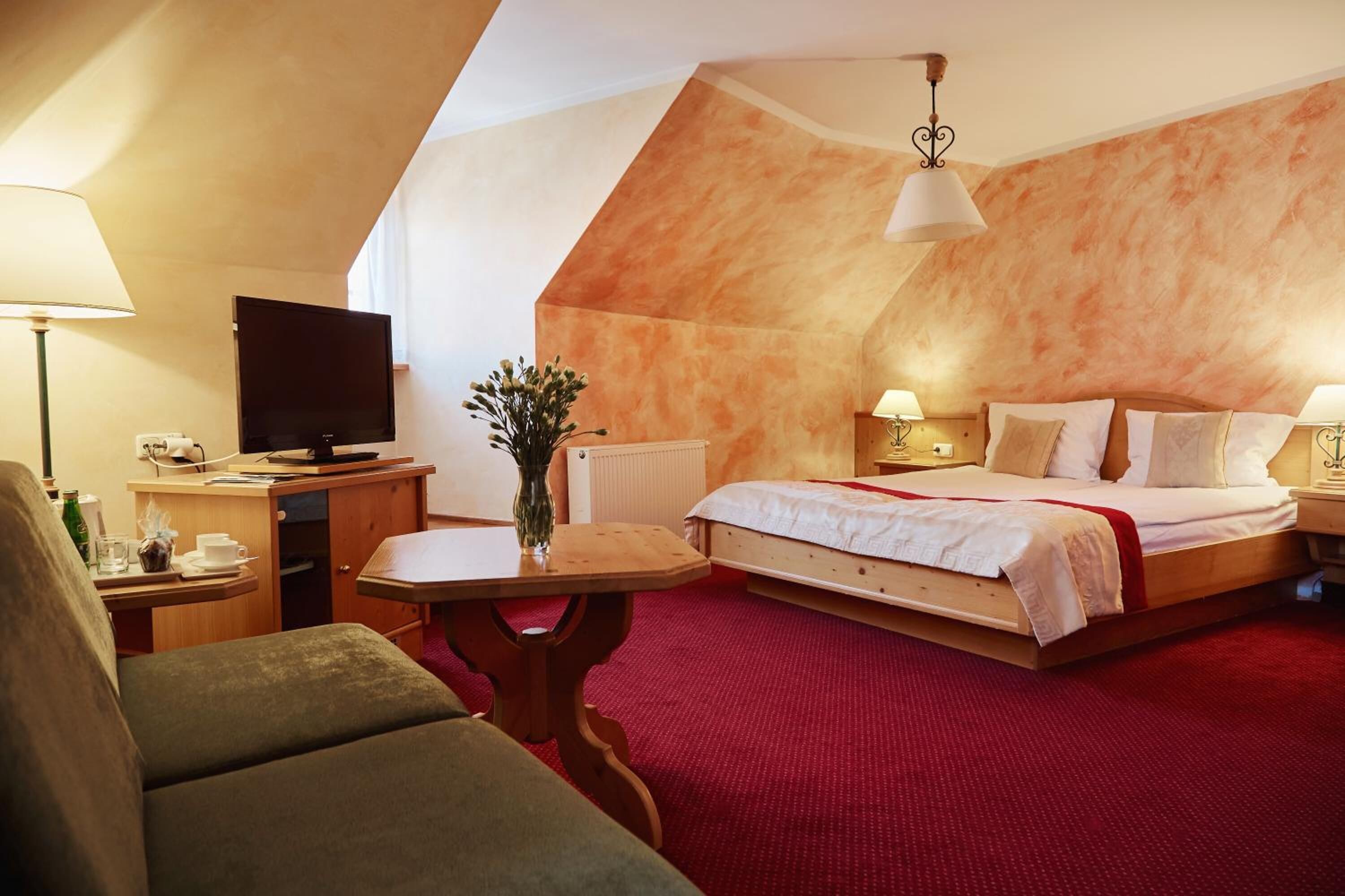 premium bedding, minibar, iron/ironing board, free cots/infant beds