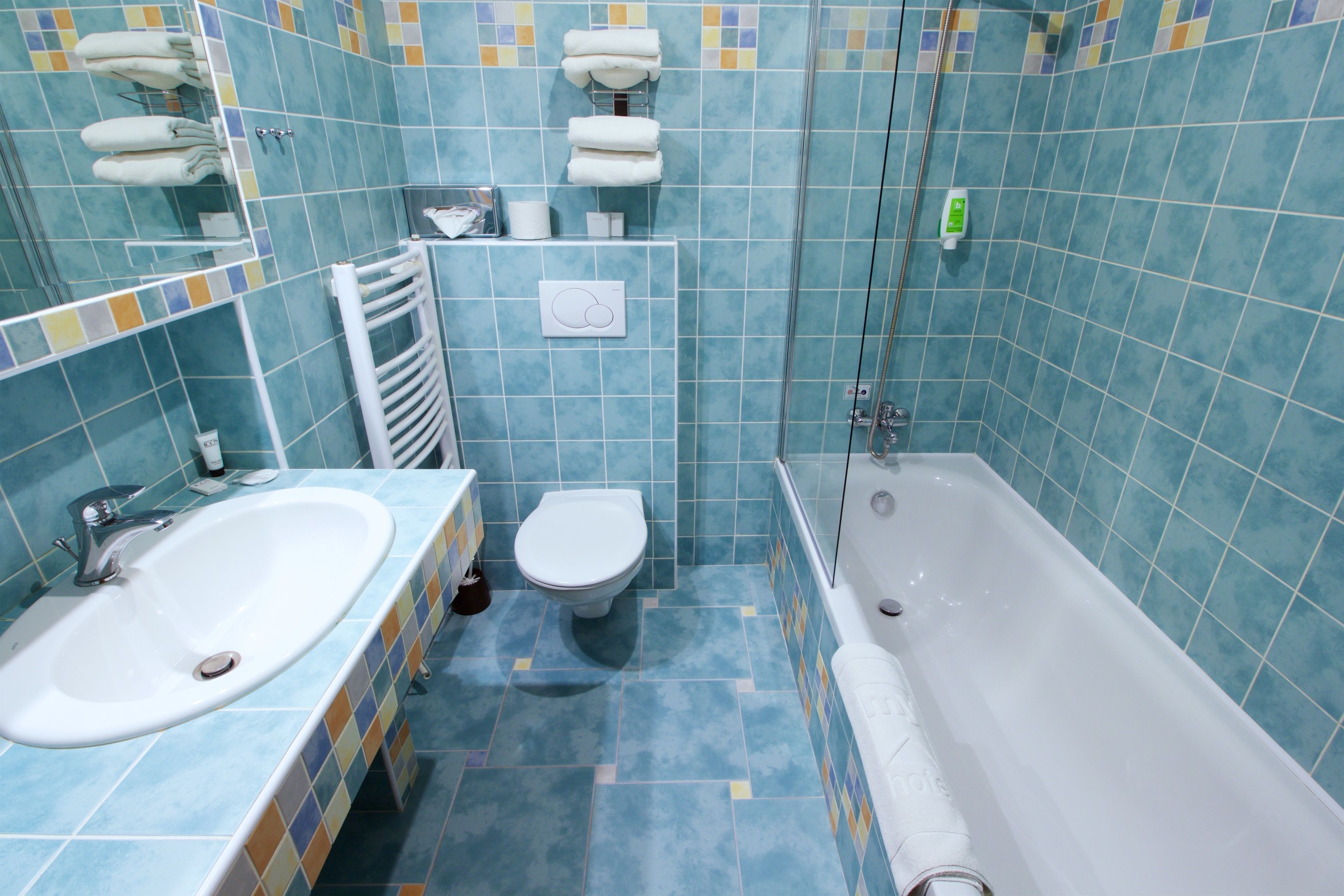 deluxe double room | bathroom | bathtub, free toiletries, hair dryer, towels