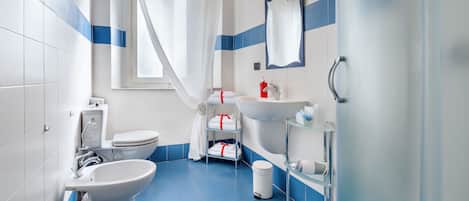 Shower, free toiletries, hair dryer, towels