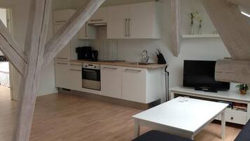 Apartment, 2 Bedrooms | Private kitchen | Fridge, stovetop, dishwasher, coffee/tea maker