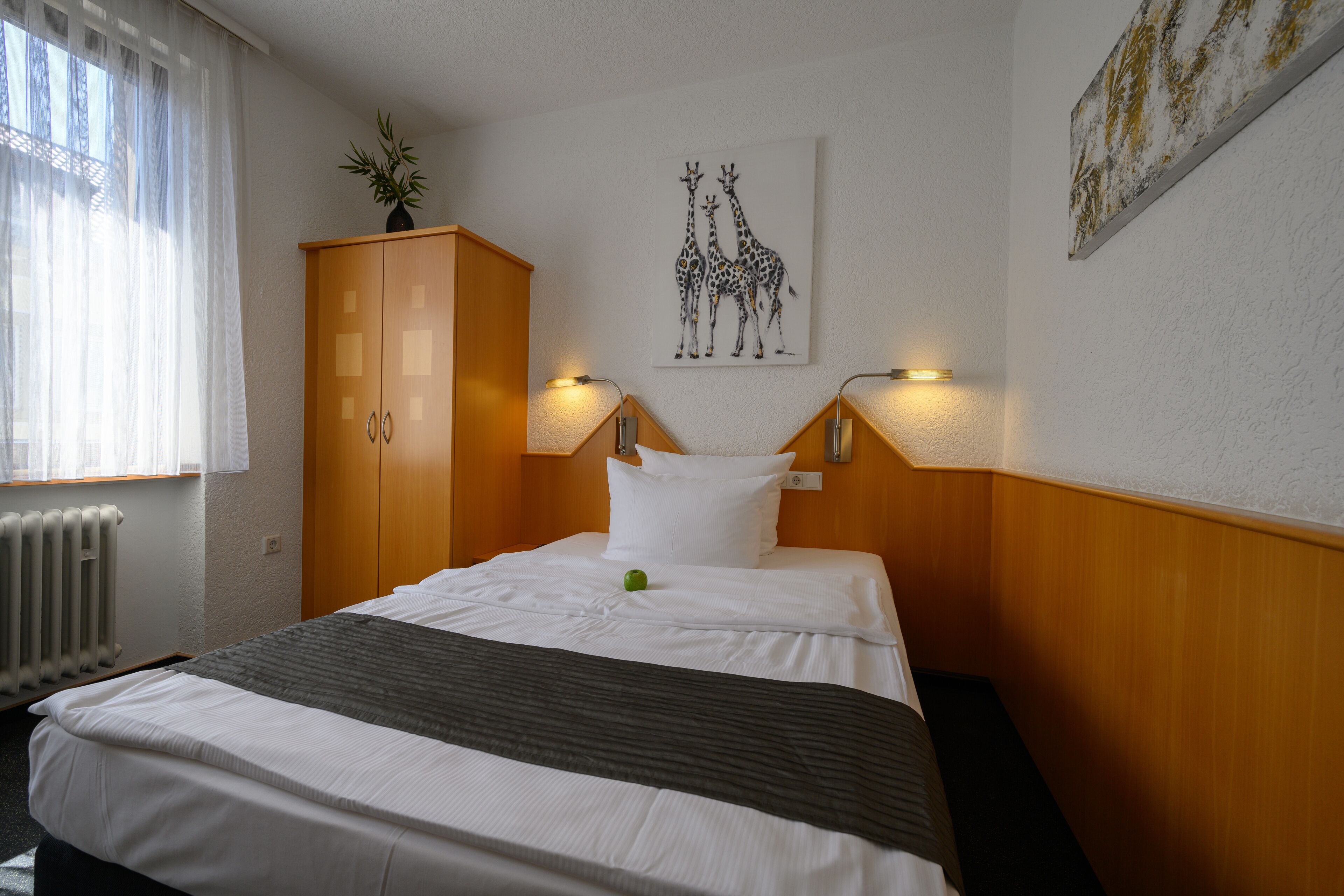 comfort single room | premium bedding, down duvets, minibar, in-room safe