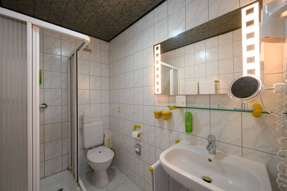 shower, hydromassage showerhead, eco-friendly toiletries, hair dryer