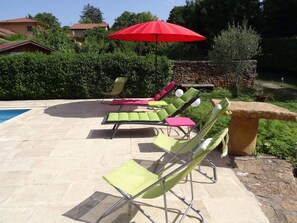 Outdoor pool, open 4 PM to 8 PM, pool umbrellas, pool loungers