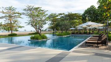 Outdoor pool, open 6 AM to 10:00 PM, pool umbrellas, sun loungers